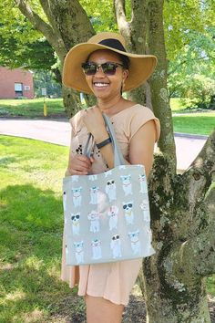 Small tote bags with lining and pockets inside. Boxed out flat bottom. Cotton webbing shoulder straps. 100% handcrafted in PA. 100% cotton canvas outside with midweight fusible interfacing throughout bag. 100% cotton muslin lining. Dimensions are: 10.5" H, 10.5" W, 2.75" D. White Reversible Rectangular Canvas Bag, Summer Reversible Cotton Shoulder Bag, Square Summer Canvas Bag, Eco-friendly Canvas Bucket Bag, Handmade Square Canvas Bag, Eco-friendly Reversible Tote Canvas Bag, Eco-friendly Reversible Canvas Tote Bag, Eco-friendly Square Canvas Bag, Tote Bag With Pockets