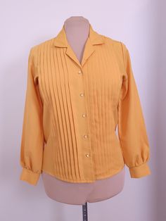 "Mustard yellow collared button up with flat iridescent buttons. The bodice has pleating on both sides.  Size 8 All clothing measured laying flat.   Measurements:  Shoulders - 15.5\"  Chest - 20\"    Length - 24.5\"  Sleeve Length - 22\" Please reach out with any questions prior to purchase. All sales are final, no returns or exchanges." Womens Blouses, Button Up Blouse, Nashville Tn, Mustard Yellow, Green Tea, Womens Clothing Tops, Nashville, Mustard, Bodice