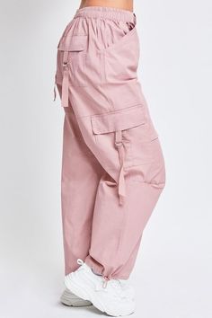 Add style, comfort, and versatility to your pant collection with our women’s elastic waist cargo pants. This relaxed-fit cargo pant is constructed with lightweight cotton fabric for maximum comfort and versatility. Our cargo pants for women have a relaxed leg, baggy fit from hip to hem, and are full-length with a drawstring hem for an option to wear open or tied for a cinched ankle. Detailed with two classic side patch front pockets, and two ring closure front and back pockets these cargo pants Woman Cargo Pants, Pink Jeans Outfit, Cute Cargo Pants, Hanfu Skirt, Side Pocket Pants, Pink Pant, Baggy Pants Women, Goodbye Party, Cargo Pants For Women