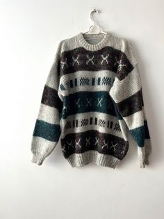 "Vintage 90s mens sweater Large size Winter Sweater Warm patterned Jumper Grandpa retro sweater Mens weekend Jumper skiing Sweater Estimated size: L Measurements: (lying flat) Length - 29\"/ 73.7 cm Pit to pit: 24\"/ 61 cm Waist: 22\"/ 56 cm Shoulder: 24\"/ 61cm Sleeve: 23.5\"/ 59.7 cm Please check measurements to insure a proper fit. Remember to allow yourself some extra room for movement. You can compare these with something from your closet that fits you well. This sweater will come to you fr Vintage Jacquard Knit Winter Sweater, Vintage Jacquard Knit Sweater For Winter, Vintage Patterned Winter Sweater, Vintage Fair Isle Patterned Sweater, Jumper Outfits, Patterned Jumper, Grandpa Core, Retro Sweater, Mens Sweater