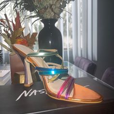 Super Chic Metallic Multicolored Heeled Sandals- Brand New! 2 Available! Size 10 Purple Sandals With 4-inch Heel And Ankle Strap, Multicolor Round Toe Heels For Party, Multicolor Round Toe Party Heels, Multicolor Open Toe Heels For Party, Multicolor 4-inch Heels For Party, Rainbow Heels For Party, Multicolor Block Heel Sandals For Party, Rainbow Heels With Round Toe For Summer, Colorful High Heel Party Shoes