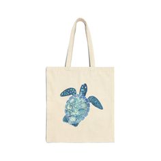 a tote bag with a blue turtle on it