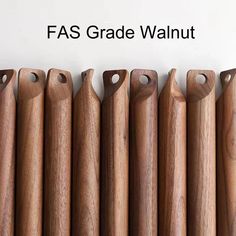 a row of wooden cutting boards with the words fas grade walnut in front of them