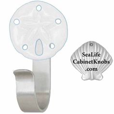 an image of a blue sand dollar on a metal hook with the sealife cabinet knobs com logo below it