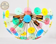 a multicolored chandelier hanging from a ceiling