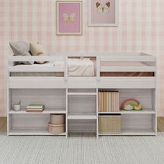 a white bunk bed sitting in a bedroom next to a pink and white checkered wall