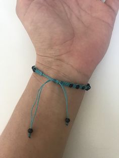 "SPECIAL OFFER!! Buy TWO get ONE for FREE!! of equal or lesser value (please, don't add your free product to your shopping cart or you will be charged for it. Pick 1 product and leave the full name of it in the \"Note to enjoywelrydesign\" Box during checkout.) This is a turquoise macrame bracelet with black crystal beads. Protect yourself from selfishness and negativity with this Kabbalah bracelet. The simplicity of this bracelet make it easy to match. And also very elegant. The bracelet is adj Kabbalah Bracelet, Leather Anniversary Gift, Leather Anniversary, Fun Bracelet, Macrame Bracelet, Free Product, Couple Bracelets, Macrame Bracelets, Cute Bracelets