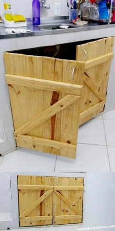 the kitchen counter is made out of pallet wood and has sliding doors on both sides