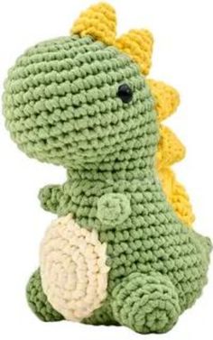 a crocheted green and yellow dinosaur stuffed animal