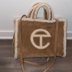 ***Last Listing Was Not Sold**** Hey Y’all, I Ordered This Bag During Christmas Last Year And I Don’t Use It At All (3 Times). It’s Authentic, I Just Don’t Like The Brand As Much. Ask Any Questions You Need, I’m Just Selling Because I Don’t Use It. I Paid The Original Price $290, So I Just Want Money Back. Listing Price Is Based On Poshmark’s Charges And In Order For Me To Get Full Refund. Telfar Ugg, Telfar X Ugg, Telfar Shopping Bag, Telfar Bags, Ugg Bag, Telfar Bag, Boat Tote, Luxury Bags Collection, Chestnut Color