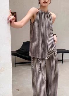 Experience the latest in French fashion with our Coffee Striped Top Wide Leg Pants Two Piece Set. Perfect for summer, this stylish ensemble is sure to make a statement.Fabric: Cotton 45%. Linen 55%Size & Fit:Fit: This garment fits true to size.Length: Size XL measures 23.79"from shoulder to hemBust: Great for any cup size. Waist: Loose Fit. Comfortable room throughout midsection.Hip: Loose Fit - room for hips.Hand Wash Cold. Total delivery time=Processing time+Shipping time. Processing time usually takes 3-5 business days. For custom made item. it may takes more than 15 days. Regular Shipping: It takes around 9 to 15 business days to United States. 10 to 25 business days to Australia. Germany. France and Italy. It may take longer than 15 business days to other countries. Fedex/Express ship Two Piece Sets Summer, Fur Sliders, Comfortable Room, Summer Fabrics, Dress Jewelry, Cup Size, French Fashion, Two Piece Set, Two Piece Sets