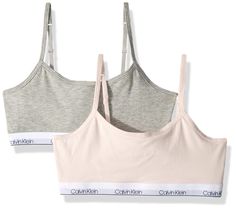 PRICES MAY VARY. Experience style and comfort with Calvin Klein's Modern Cotton Classic Crop for girls. Trendy design perfect for everyday wear or layering under outfits. Superior cotton blend ensures softness and breathability. 2-pack provides great value for a stylish wardrobe staple. Calvin Klein – Where Fashion Meets Comfort for the next generation. Calvin Klein Girls, Calvin Klein Store, Small Bra, Cotton Bralette, Crop Bra, Swimwear Brands, Comfortable Fashion, Outfits For Teens