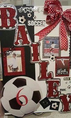 a soccer themed scrapbook with red and white letters, pictures, and a ball