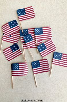 small american flags on toothpicks with text overlay