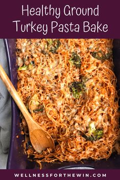 healthy ground turkey pasta bake in a casserole dish with broccoli and cheese