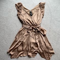 Brand New With Tags Express Women’s Satin Tan Gold Ruffle Shoulder Tie Waist Layered Dress V Neck Xs Beige V-neck Mini Dress With Ruffles, Brown V-neck Dress With Ruffle Hem, Beige V-neck Midi Dress With Ruffles, Brown Short Sleeve Mini Dress With Ruffles, Brown Ruffled Short Sleeve Mini Dress, Brown Ruffled Mini Dress With Short Sleeves, Brown Mini Dress With Ruffles And Short Sleeves, Chic Beige Ruffle Dress For Summer, Chic Beige Summer Ruffle Dress