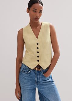 ME+EM's Yellow Pinstripe Tailored Vest is set on a Fresh Lemon backdrop with a summer pinstripe to complement your pick of pieces. Shop now. Lemon Backdrop, Tailored Vest, Vest Layering, Navy Striped Shirt, Nyc Outfits, Yellow Vest, Beige Vest, Lace Trim Blouse, Rib Knit Top