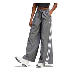 Adidas Sportswear Pants For Spring, Casual Adidas Bottoms, Adidas Relaxed Fit Pants, Adidas Relaxed Fit Pants With Logo, Casual Adidas Logo Pants For Spring, Spring Casual Pants With Adidas Logo, Adidas Logo Pants For Spring Streetwear, Adidas Sweatpants For Spring Streetwear, Sporty Adidas Bottoms With Relaxed Fit