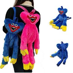 two stuffed animals in the shape of monsters are being held by a woman's back