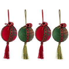 three ornaments with tassels hanging from them