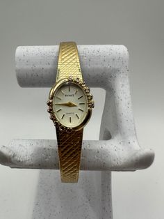 Behold the rare and exquisite Nicolet vintage ladies diamond Quartz watch in a captivating gold tone - an exceptional gift for her. This fashion designer timepiece features a tastefully adjustable strap, ensuring a perfect fit for any wrist. In good shape and adorned with diamonds, it radiates timeless allure. Fitted with a new battery, this watch seamlessly combines style and functionality, making it an extraordinary accessory for women with a discerning taste for unique and elegant pieces. Comes with a Swiss eta movement  Please message me with any questions Classic Gold Watches With Diamond Accents, Gold Watches With Diamond Accents For Formal Occasions, Formal Gold Watches With Diamond Accents, Formal Diamond Watch With Metal Dial, Classic Gold Diamond Watch For Anniversary, Yellow Gold Watches With Diamond Accents For Gift, Yellow Gold Watches With Diamond Accents As Gift, Gold Diamond Watch With Accents, Gold Diamond Watch With Diamond Accents