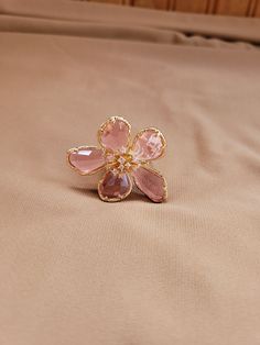 Pink glass flower ring.  The flower measures 1.75 inches and the band is cut adjustable in the back and sized to US 7.75.  Gold plated. Adjustable Crystal Flower Ring, Rose Gold Flower Rings For Party, Elegant Adjustable Pink Flower Ring, Adjustable Flower Crystal Ring, Formal Pink Flower Ring, Adjustable Flower Ring For Party, Elegant Pink Flower Ring For Party, Pink Magnolia Flower, Pink Magnolia