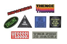 various stickers that are on top of each other, including one with the words