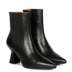 Walk a little taller in these beautiful Elliana ankle boots. These pointed toe boots are the perfect way to add a glamorous look to your everyday styling. Featuring outside elasticated panel and inside zip to ensure comfortably slip them on and off. Completed with leather lining and padded leather footbed. The slip on boot sit on a 6.35 cm (2.5 inches) sculpted heel. Closure - Zip Upper - Black Leather Lining -Orange Leather Insole - Orange Leather Sole - Black Tunit Heel Height - 6.35 cm (2.5 I Black Heeled Boots With Leather Sole And Snip Toe, Red Leather Sole Ankle Heeled Boots, Black Ankle-high Heeled Boots With Leather Lining, Black Heeled Boots With Leather Sole, Medium Width, Black Suede-lined Ankle Boots, Heeled Chelsea Boots, Pointed Toe Boots, Slip On Boots, Orange Leather