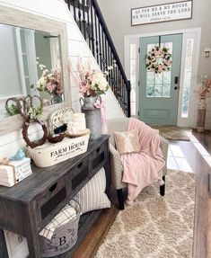 the entryway is decorated with pink and white flowers