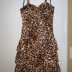 Leopard Print, Mini Dress With Tiered Ruffle Bottom, Spaghetti Straps, Sweetheart Neckline And Wired Bust. Size: 6 (Fits Like A Size Small) Never Worn But Do Not Have The Tags Materials: Shell Is 97% Cotton, 3% Spandex; Liner Is 100% Polyester Summer Leopard Print Dress With Ruffles, Summer Leopard Print Dresses With Ruffles, Fitted Tiered Brown Dress, Fitted Brown Tiered Dress, Brown Sleeveless Mini Dress With Ruffles, Sleeveless Brown Mini Dress With Ruffles, Fitted Leopard Print Dresses With Ruffles, Leopard Print Mini Dress, Black Spaghetti Strap Dress