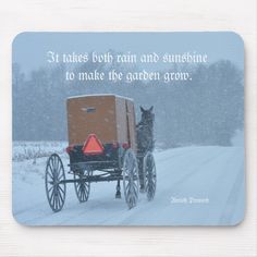 a horse drawn carriage in the snow with a quote on it's back mouse pad