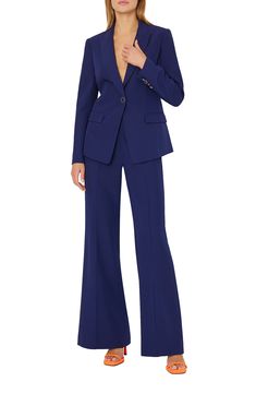 A pintuck pleat calls out the expert tailoring in a pair of cady pants that work for desk days and drinks dates. 34" inseam Zip fly with hook-and-bar closure Front slant pockets; back welt pockets 97% polyester, 3% spandex Dry clean Imported Tailored Structured Pantsuit For Work, Tailored Structured Workwear Pantsuit, Elegant Structured Pants For Office, Elegant Office Suits With Belt Loops, Notch Lapel Suits With Belt Loops For Work, Elegant Pantsuit With Welt Pockets For Workwear, Fitted Single Breasted Bottoms For Workwear, Formal Structured Bottoms With Welt Pockets, Tailored Office Pantsuit With Belt Loops