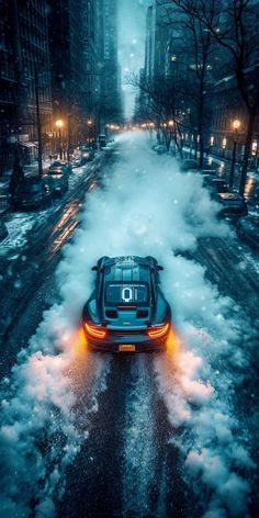 the back end of a car driving down a snow covered street in front of tall buildings