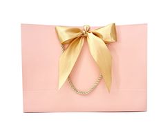 a pink box with a gold bow on the top and a rope around the bottom