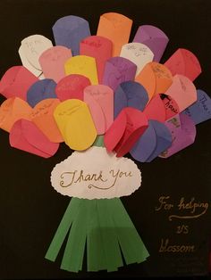 a bouquet of paper hearts with the words thank you for helping us blossom