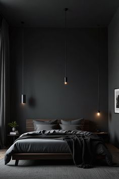 a bedroom with black walls and wooden bed frame in the middle, along with two hanging lights