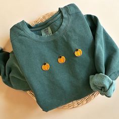 Cozy up with our Comfort Colors Pumpkin Crewneck Sweatshirt this fall season! This makes the perfect sweatshirt to lounge this fall and halloween season.  - Our sweatshirt material is super soft and high quality! ♡ - Garment-Dyed Sweatshirt (Sustainable style)  - 80% cotton, 20% polyester - All our sweatshirts run a UNISEX fit. (Both for men and women) They fit true to size. But if you like a more baggy look, we highly recommend sizing up. - These letters are embroidered iron-on patches that hav Comfy Cotton Sweater For Fall, Comfortable Cotton Sweater For Fall, Comfortable Green Sweater For Fall, Green Cotton Sweater For Fall, Cozy Orange Crew Neck Top, Comfy Sweater For Fall, Comfy Soft-washed Sweater For Fall, Cozy Fit Green Top For Fall, Crew Neck Cotton Sweater For Fall