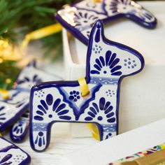 blue and white ceramic horse ornaments on display