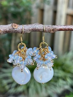 Beautiful Moonstone cluster Coin Pearl earrings. Perfect dangle length @ 2 1/4 inch. Gold plated ear wires and tarnish free wire Ideal for a Brides wedding day All orders carefully wrapped in a velvet pouch, ready for gift giving. Ships 📫 USPS First Class Mail with tracking White Pearl Drop Dangle Cluster Earrings, White Pearl Drop Cluster Earrings, Handmade White Dangle Cluster Earrings, Wire Wrapped Crystal Dangle Earrings For Wedding, Wire Wrapped Crystal Drop Earrings For Wedding, White Wire Wrapped Dangle Crystal Earrings, White Wire Wrapped Drop Crystal Earrings, White Wire Wrapped Drop Earrings, White Wire-wrapped Drop Crystal Earrings