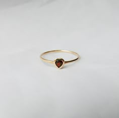 Garnet heart ring, heart ring, Birthstone heart ring, gold heart ring, dainty heart ring Garnet Heart Ring, 14k Gold Heart-shaped Solitaire Ring, Heart-shaped 14k Gold Ruby Promise Ring, 14k Gold Heart Ring With Birthstone For Promise, 14k Gold Heart-shaped Ruby Ring For Promise, 14k Gold Solitaire Heart Ring As Gift, Yellow Gold Stackable Heart Cut Rings For Promise, Yellow Gold Heart Birthstone Promise Ring, 14k Gold Solitaire Heart Ring For Valentine's Day