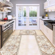 the kitchen is clean and ready to be used for cooking or dining room furniture, as well as an area rug