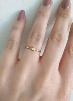 14K 9K Tiny Gold Star Ring, Delicate gold ring, Dainty star ring, Everyday gold ring, Minimal gold ring, Stacking ring, Gift for her, Modern gold ring, Stackable gold ring, 14K rose gold ring, FREE EXPRESS SHIPPING Dainty 14K or 9K solid gold ring with a tiny star. Whisper...Shine like the stars! More dainty rings here: https://www.etsy.com/shop/WhisperGold?ref=seller-platform-mcnav&section_id=23760120 -------------------------------------------------- D E T A I L S 14K or 9K Solid Gold Band Gold Star-shaped Everyday Rings, Minimalist Star Shaped Rings For Everyday, Dainty Star-shaped Yellow Gold Rings, Minimalist Gold Star Shaped Rings, Minimalist Star-shaped Rings For Everyday, Dainty Yellow Gold Star Rings, Minimalist Gold Star Rings, Minimalist Star-shaped Midi Rings As Gift, Minimalist Star-shaped Midi Rings For Gifts