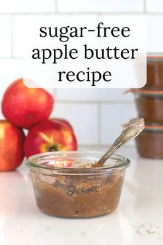 an apple butter recipe in a glass bowl with a spoon on the counter next to some apples