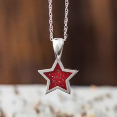 Let her know that she is your one and only with this red star necklace in sterling silver. The Stardust pendant is crafted with shavings of meteorite in a bed of red enamel. She will love this dainty sterling silver star pendant necklace.The perfect gift for a graduate whose school colors are silver or gold and red. Engrave the backside of the pendant withtheir initials and graduation year for a one-of-a-kind gift that reminds them to keep reaching for the stars. DETAILS OF THE PENDANT NECKLACE Meteorite Necklace, Meteorite Jewelry, Meteorite Pendant, Necklace Chain Types, Star Necklace Silver, Diamond Fashion Rings, Star Pendant Necklace, Diamond Gift, Bead Charm Bracelet