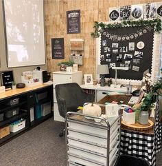 an office with black and white decorations on the wall