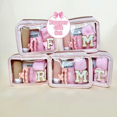 three pink suitcases filled with personal items and the words pamper gift set in them