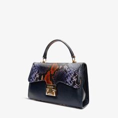 Width: 9" Height: 7" Width: 4.5" Full length of the strap : 41" Venezia Navy Blue Leather Handbag: Timeless Sophistication in Deep Blue Hues Supreme Quality Craftsmanship: Immerse yourself in luxury with this handbag, meticulously crafted from 100% genuine calf leather, ensuring an unparalleled standard of excellence. Elegant Embossed Pattern: The leather cover features a subtle yet sophisticated embossed pattern, adding a touch of timeless allure and elevating the Venezia Navy Blue Handbag to a Luxury Blue Shoulder Bag With Top Carry Handle, Blue Luxury Bag With Adjustable Strap, Blue Flap Shoulder Bag With Top Carry Handle, Blue Crossbody Flap Bag With Top Carry Handle, Luxury Blue Handheld Satchel, Blue Rectangular Flap Bag For Formal Occasions, Navy Leather Bag With Handles, Formal Blue Rectangular Flap Bag, Blue Luxury Flap Bag For Formal Occasions