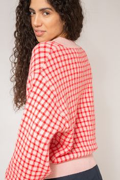 Break all the rules with our red and pink gingham check cardigan. This oversized knitted cardigan is perfect to complete a casual outfit and add some colour to your wardrobe. Style this bold button-down knit with some jeans and a cute top for a casual date look. - Red and pink gingham check knitwear - Dropped sleeves - Button down cardigan Cozy Plaid Sweater For Spring, Plaid Long Sleeve Sweater For Spring, Oversized Plaid Casual Cardigan, Oversized Casual Plaid Cardigan, Casual Oversized Plaid Cardigan, Trendy Red Oversized Cardigan, Trendy Oversized Red Cardigan, Chic Plaid Cardigan For Spring, Casual Plaid Sweater With Houndstooth Pattern