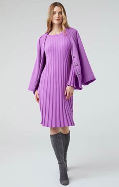 Awaken your inner romantic in this trend-right pleated sweater dress. Knit in a silky luxe yarn, ruffled sleeves lend drama, while the bold shade of Dahlia Purple adds excitement. Elegant Purple Winter Dresses, Elegant Spring Sweater Dress For Party, Elegant Spring Party Sweater Dress, Chic Dresses With Cape Sleeves For Fall, Elegant Knit Midi Dress, Fall Fitted Midi Dress With Ruffle Sleeves, Chic Purple Midi Dress For Winter, Fall Midi Dress With Ruffle Sleeves And Fitted Design, Fall Ruffle Sleeve Midi Dress