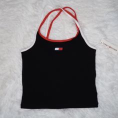 Size Small , Medium , Large, Xl New With Tags Ribbed Knit Construction In Heather Grey Colorway. Embroidered Tommy Hilfiger Logo At Center Chest. Double Spaghetti Shoulder Straps With Crisscrossed Back In Navy And Red. 94% Cotton, 6% Spandex. Machine Wash Cold, Lay Flat To Dry. Size & Fit: Slim Cropped Fit. 14" (36cm) Total Length From Shoulder To Bottom Hem Tommy Hilfiger Stretch Tops For Summer, Basic Cotton Tommy Hilfiger Tops, Fitted Sporty Tops By Tommy Hilfiger, Tommy Hilfiger Tops Women, Sporty Fitted Tommy Hilfiger Tops, Tommy Hilfiger Sporty Fitted Tops, Tommy Hilfiger Sporty Black Tops, Tommy Hilfiger Red Cotton Top, Tommy Hilfiger Crop Top